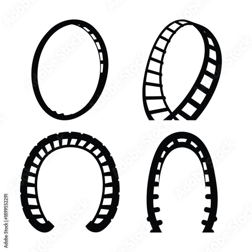 Abstract roller coaster track elements showcasing various loop and curve designs in black and white
