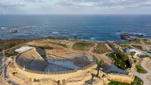 Aerial view of the Roman amphitheater of Caesarea and its remains on the Mediterranean coastline