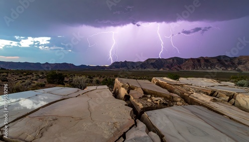 Majestic lightning illuminates desert landscape over cracked, pale rock