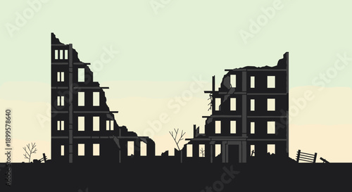 Dark silhouette of abandoned ruined buildings against a soft gradient sky