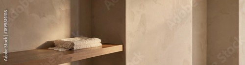 Minimalist interior design with textured walls and wooden shelf