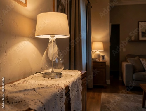 Cozy living room with warm lighting and elegant table lamp