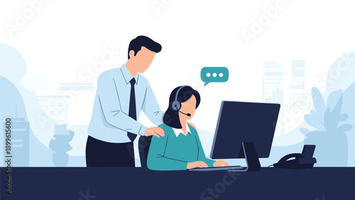 Female customer service representative with a headset works at a computer while a male manager offers support.