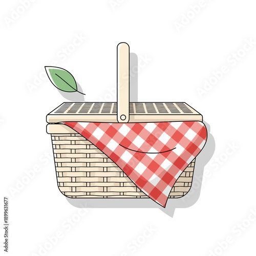 Picnic basket with a red and white checkered cloth and leaf.
