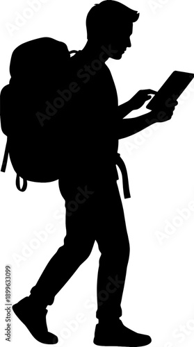 A silhouette of a man hiking with a backpack, consulting a map