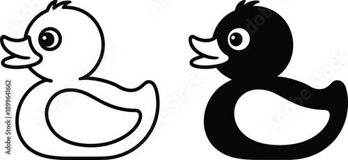 Two black and white rubber ducks with different expressions and colors