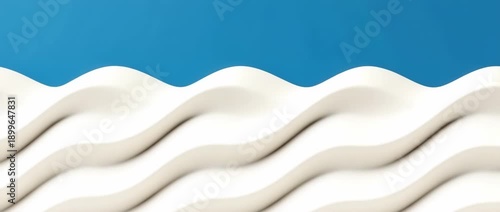 Abstract white wavy texture against  solid bright blue  creates  dynamic smooth pattern