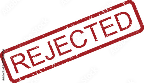 A red rectangular rubber stamp mark with the word REJECTED diagonally on a white surface