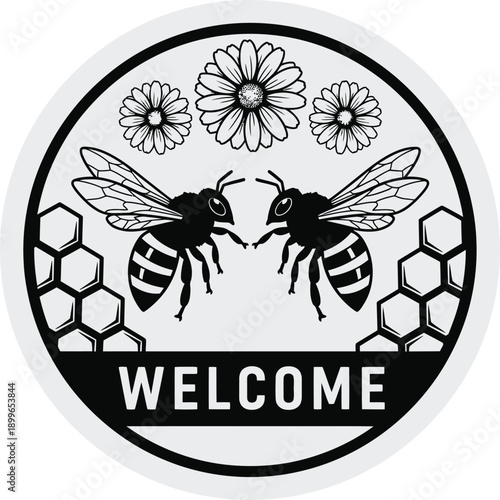 Black and white bee welcome sign with honeycomb and flowers