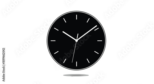 Minimalist black wall clock with white hands showing the passage of time