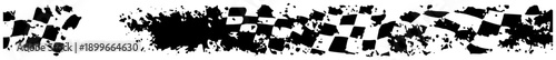 Grunge checkered flag banner with ink splatters and racing style