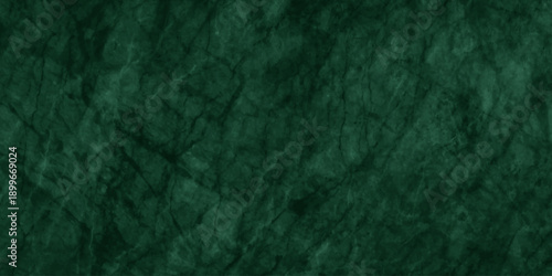 Abstract Elegant dark green background with mottled vintage texture in old fancy background design, texture of colored parchment paper.