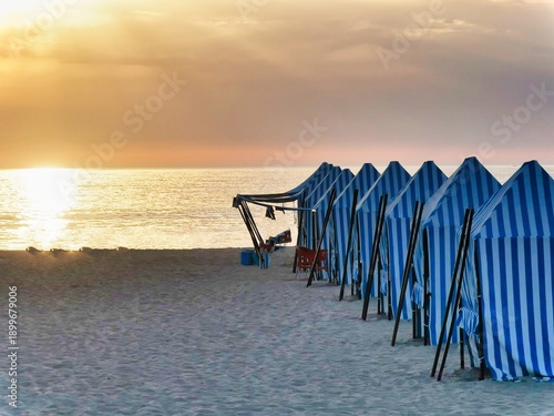 Vászonkép Outdoor restaurant at sunset