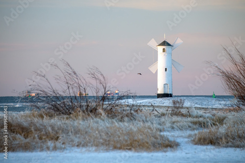 Stawa Młyny Beacon in Swinoujscie During Frozen Winter on the Baltic Sea