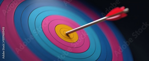 Arrow hitting the middle of a vibrant archery target symbolizing precision and concentration