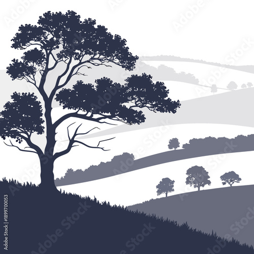 A serene landscape with a solitary tree standing tall on a hill.