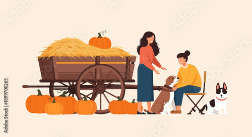 A rustic scene with a hay-filled wagon, pumpkins, and people with dogs