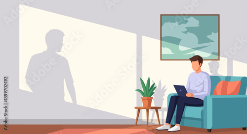 A person sits on a sofa using a laptop, with a shadow on the wall