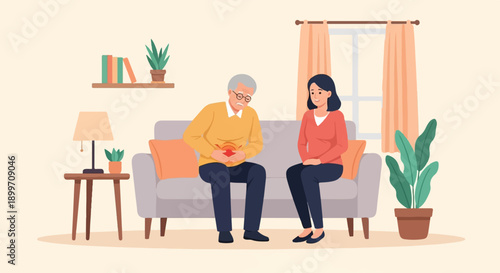 An elderly man clutches his stomach in pain while a woman sits beside him on a couch