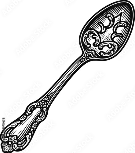 Ornate vintage silver spoon with intricate floral and decorative engravings, antique cutlery design