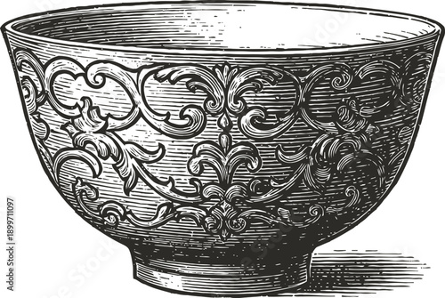 Ornate vintage bowl with intricate floral patterns and decorative swirling motifs