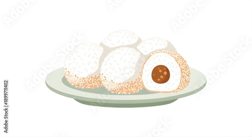 Sweet and delightful coconut-coated dessert balls, featuring a rich brown filling, artfully presented on a plate, perfect for a delectable treat or festive celebration