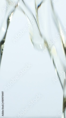 Macro Texture of Sunflower Oil, Flow Vertical Slow Motion