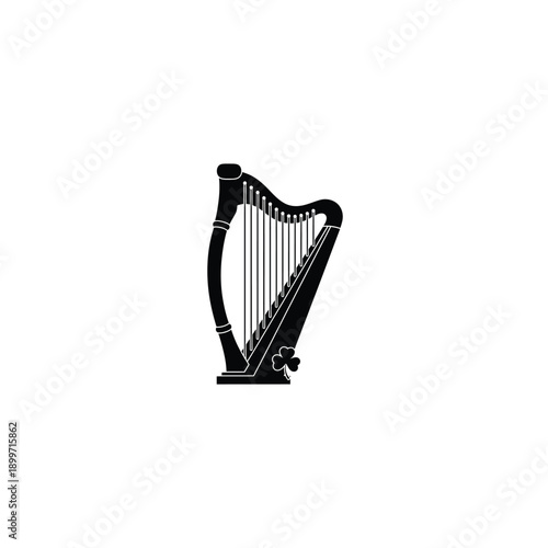 Elegant Black Silhouette of a Harp with Clover Accent