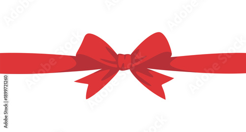 A bright red ribbon tied in a bow on a white background