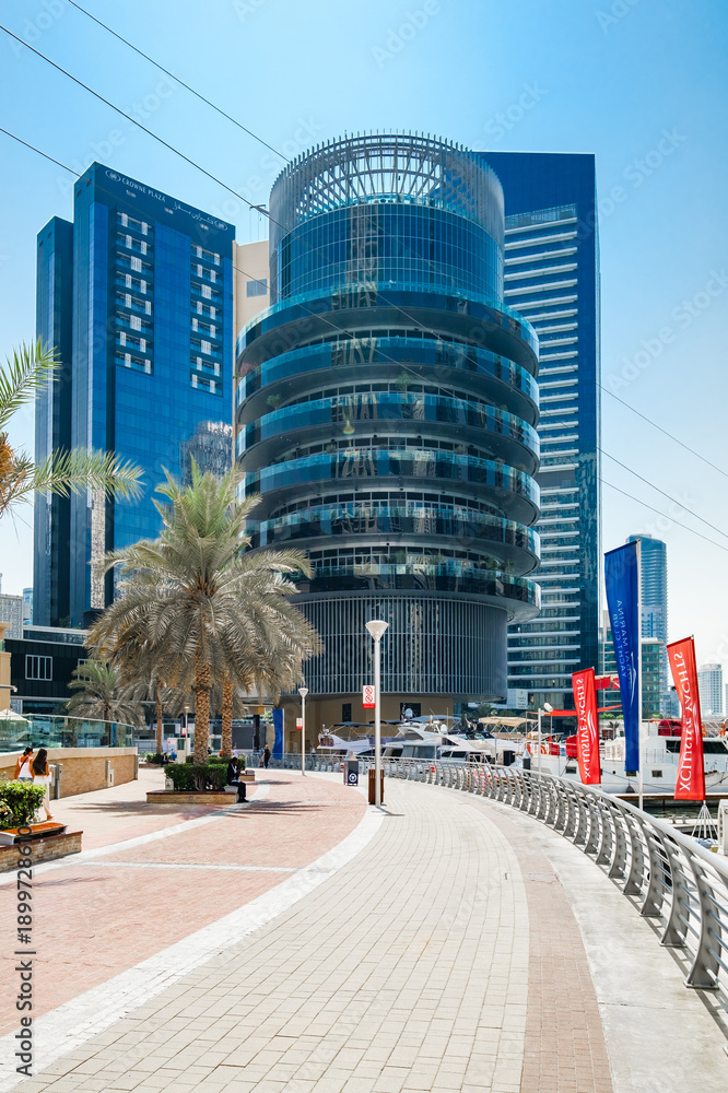 Fototapeta premium Dubai, UAE – october 06, 2025: Dubai Marina, Pier 7, vertical frame