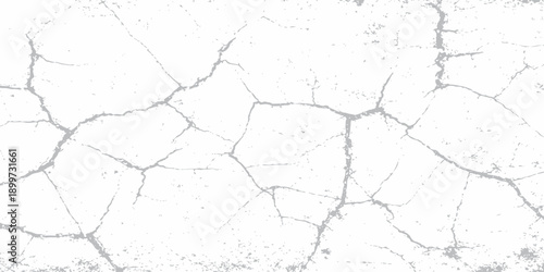Old cracked concrete wall with a rough grunge texture and dirty cement surface showing a broken pattern on gray plaster material