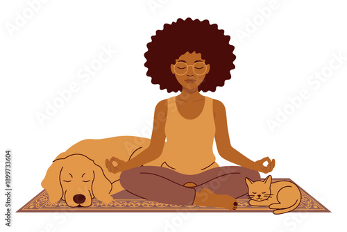 A woman meditates peacefully with her dog and cat on a yoga mat
