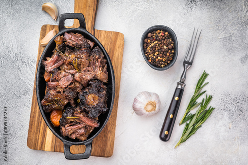 Tableau sur toile Homemade beef oxtail ragout in cast iron skillet, gelatin rich slow cooked meat
