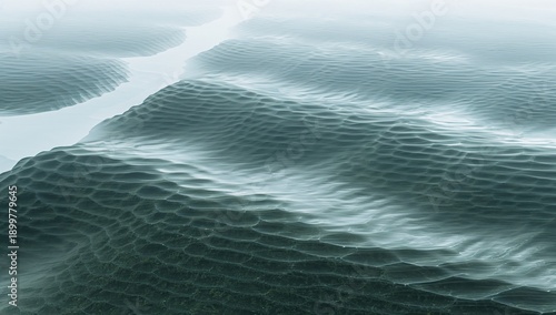 Waves and Ripples Create Patterns on the Surface of Water in a Calm Setting D...