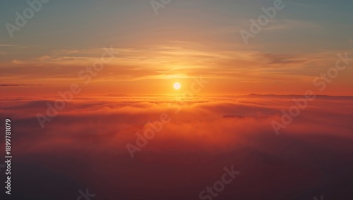 Sunset Above the Clouds With Bright Colors in the Evening Sky Near a Mountain...
