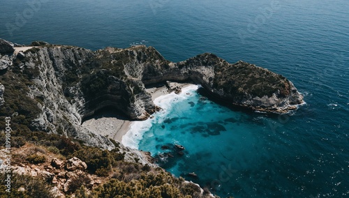 Coastline View With Cliffs and Waves Under a Clear Sky in a Seaside Location