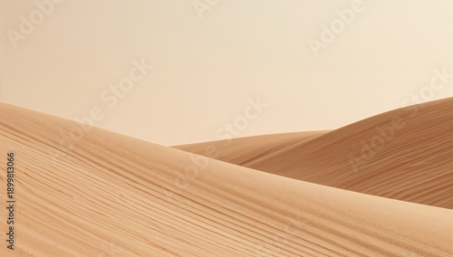 Sand Dunes Stretch Across a Vast Landscape Under a Clear Sky in the Desert Du...