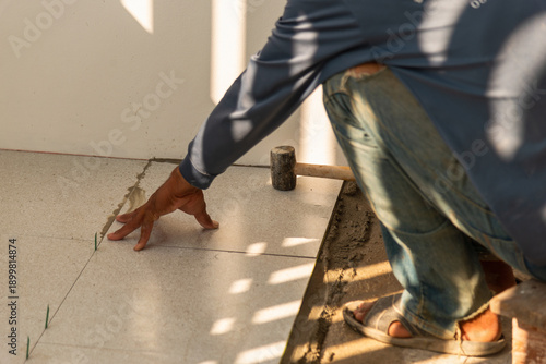 Obraz na plátně Tile installation process home renovation step-by-step guide indoor close-up diy