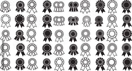 Collection of various black and white rosette award ribbons on white background