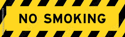 Yellow and black color with line striped label banner with word no smoking