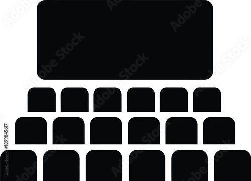 Movie theater or cinema with large screen and seats. Cinema or theater auditorium rows of seats facing a large, blank screen. 
