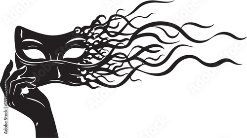 Hand holding a black mask with flowing tendrils design