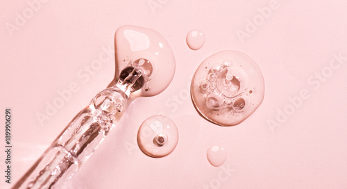 Tableau sur toile Cosmetic dropper with serum, beauty cosmetics dripping, on pastel background