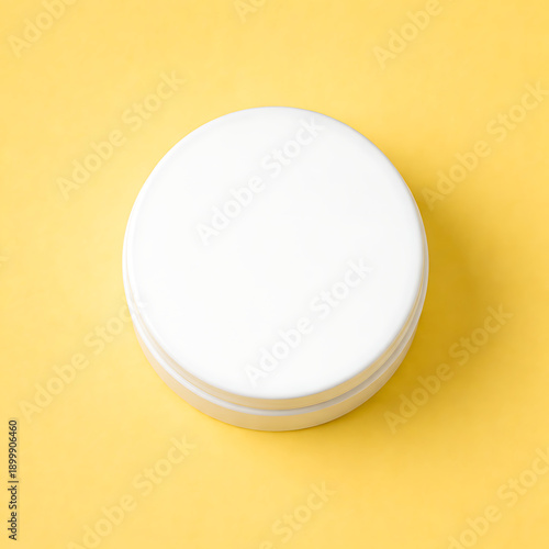 Top view flat lay of blank product container, yellow