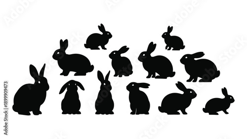 A collection of black silhouettes of rabbits in various poses and positions Vector
