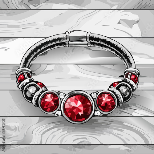 Unique handcrafted bracelet featuring silver and deep red stones on textured wooden background