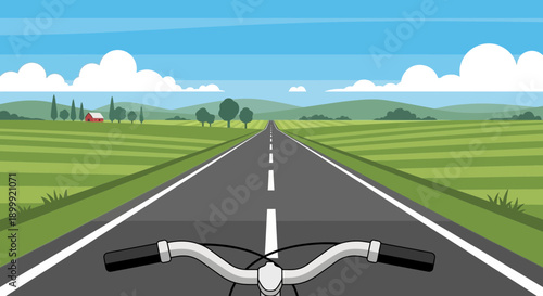 First-person view of bicycle riding on a long country road through green fields
