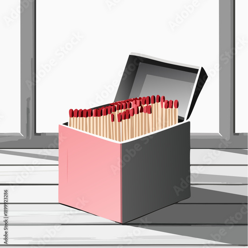 Open pink matchboxes displaying wooden matchsticks with red tips on light wood surface near a window, casting long shadows