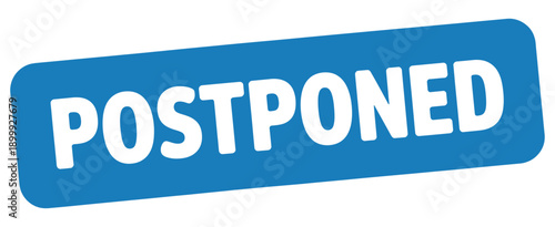 A blue rectangular sign displaying the word postponed in white lettering