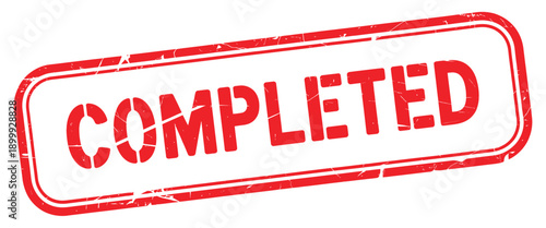 A vibrant red completed stamp with a distressed texture on white background